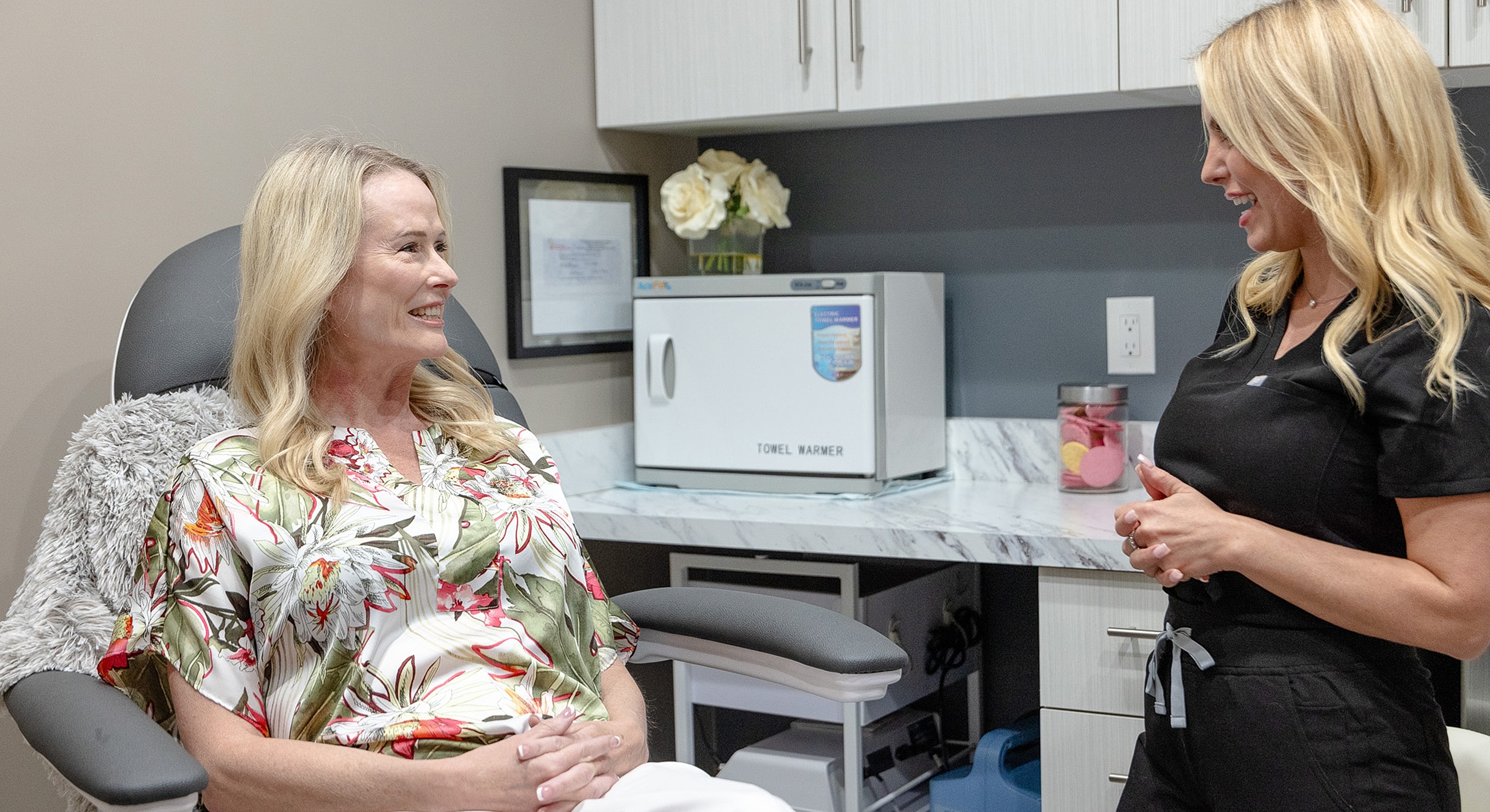Patient consultation in a medical office setting.